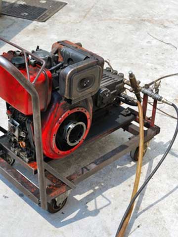 Hydro-jetting machine for high pressure drain cleaning
